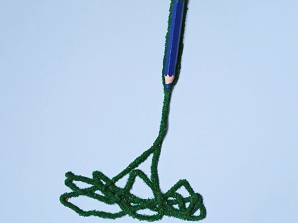 Potlood: blauw met groen kluwen